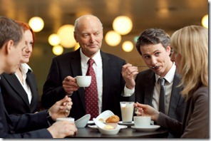 business team enjoying coffee break